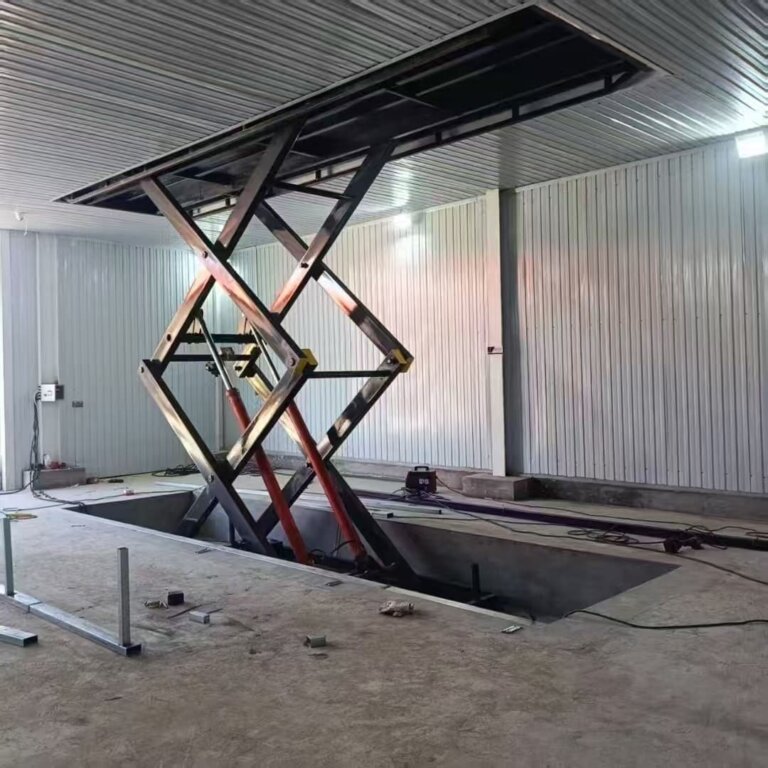 Custom a long scissor lift for a Jiangxi client to efficiently transport fertilizers to the second floor, enhancing storage efficiency